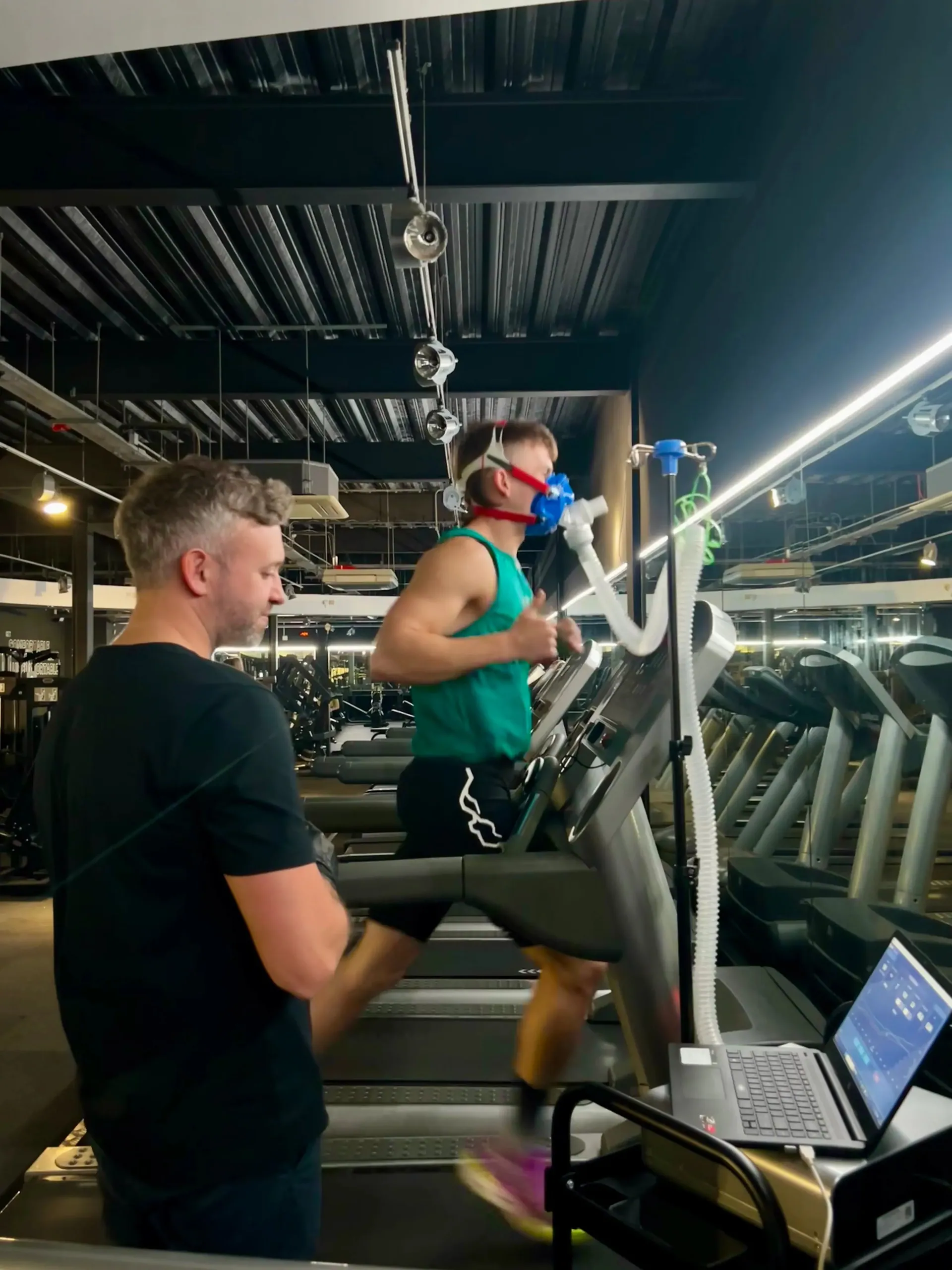 A person running on a treadmill during a Telomyx VO2 Max test